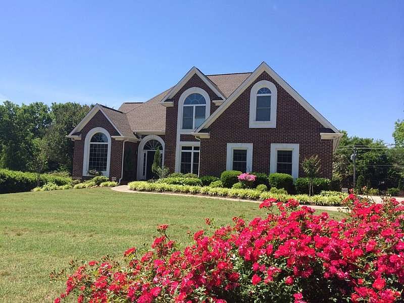 Beautiful all brick home
						:
						Large front yard and beautiful landscaping.