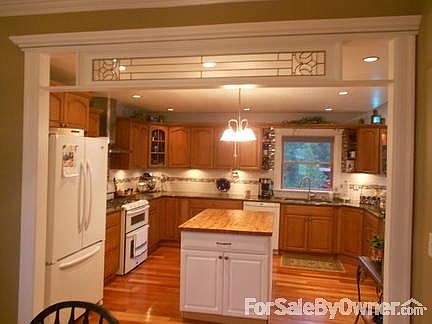 Rear of home : Double doors, both of which open.