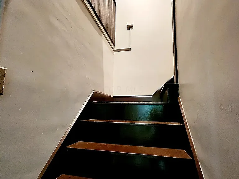 Stairs to third floor