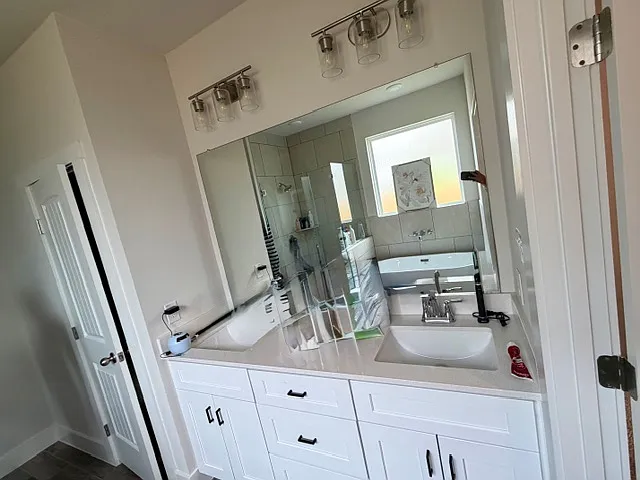 Master Bath with vanity mirror, Jaccuzi, Walk-in Shower and a very generous walk-in closet