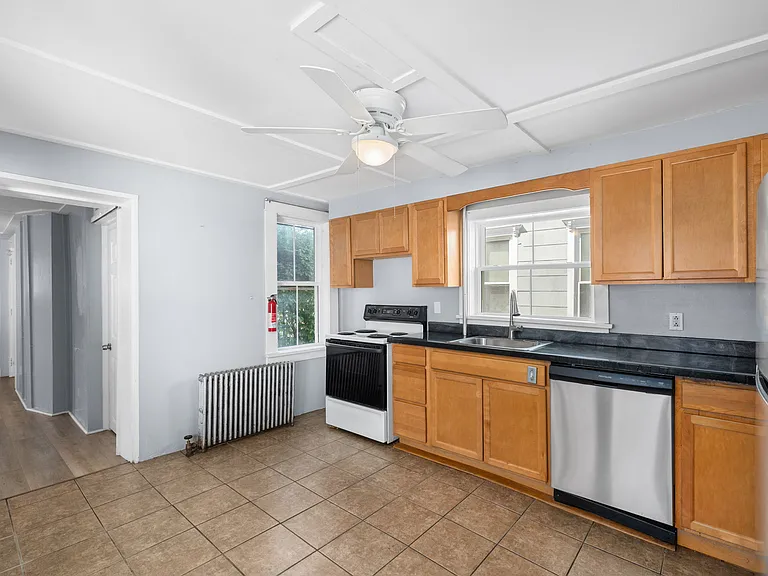 61 E 3rd St — Photo 17