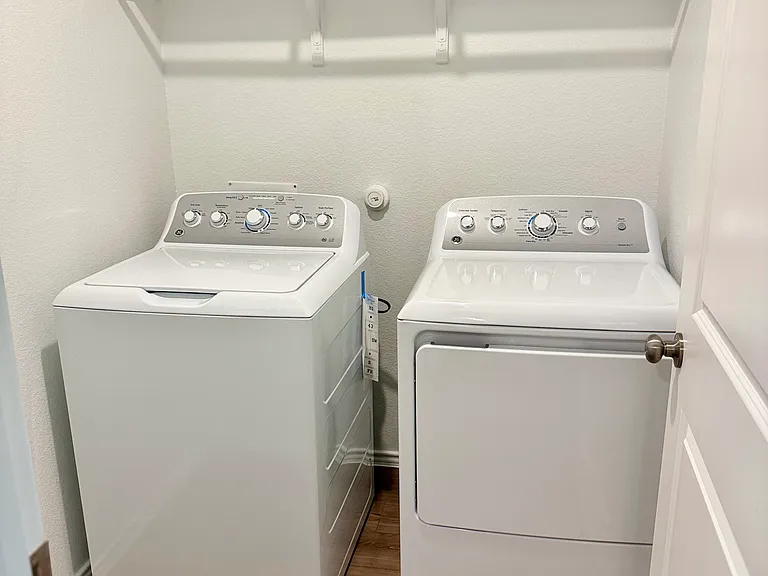 Laundry room with washer and dryer