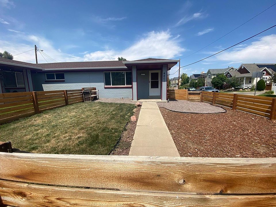 Front entrance with fenced in and gated patio.