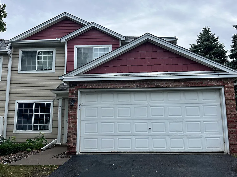 Attached two-car garage and private driveway