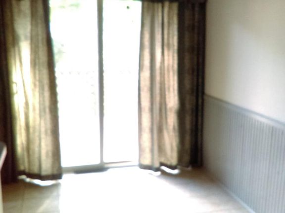 Dining area. Doors lead to deck