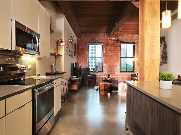Chef islands and quartz countertops in kitchen