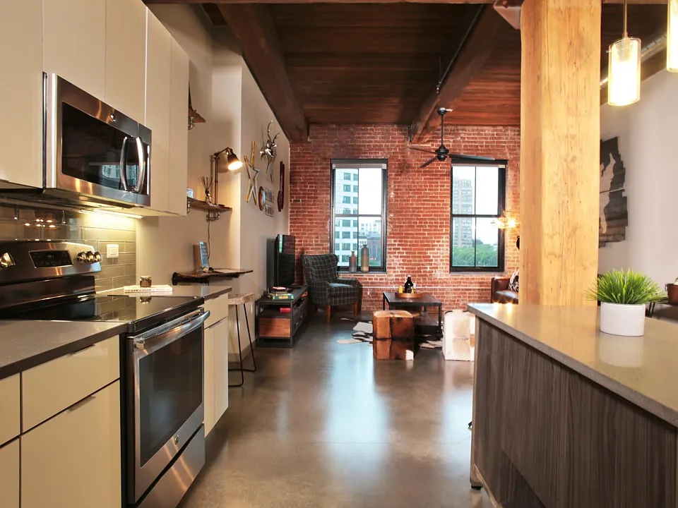 Chef islands and quartz countertops in kitchen