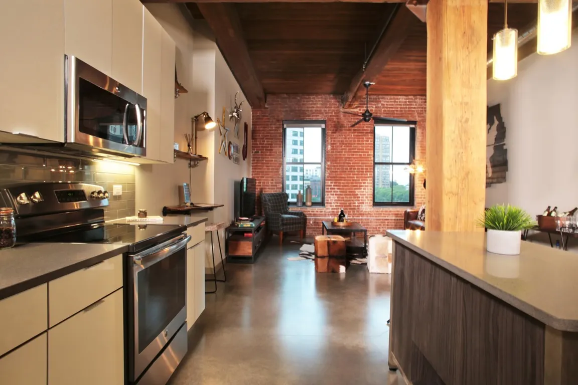 Chef islands and quartz countertops in kitchen