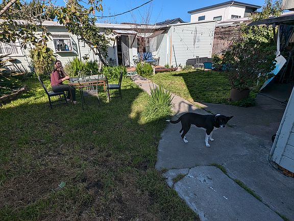 cottage with separate fenced yard.