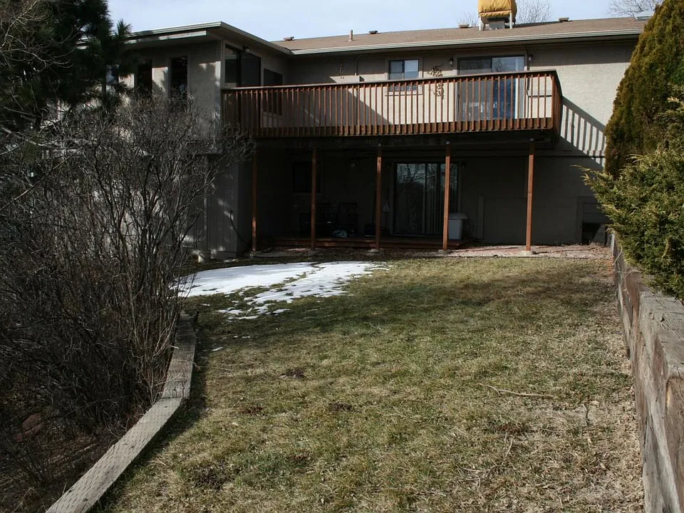 Private backyard abutting wildlife corridor