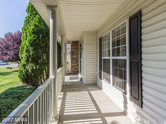 Exterior (Front) with wraparound porch