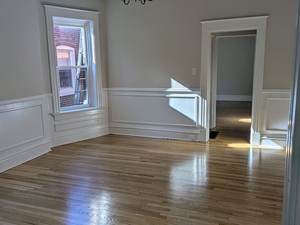 Middle living room connecting dining/front room with the main bedroom. Hardwood floors were just sanded and refinished.