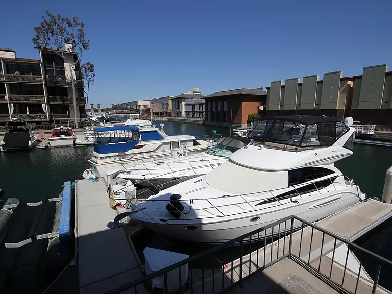 View of picturesque marina from your private wraparound balcony!