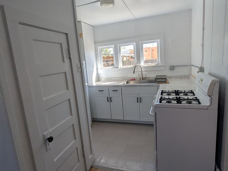 Open floor plan between living room and remodeled kitchen.