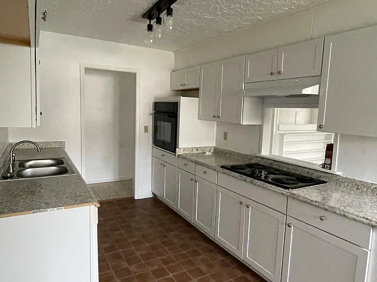 New cabinets and countertops and light fixtures