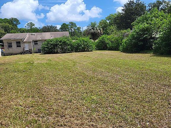 Big deep yard with BBQ pad.