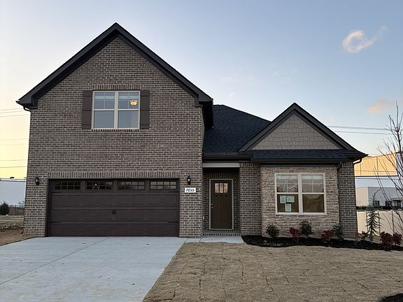 Exterior of home feature 4 sides brick.