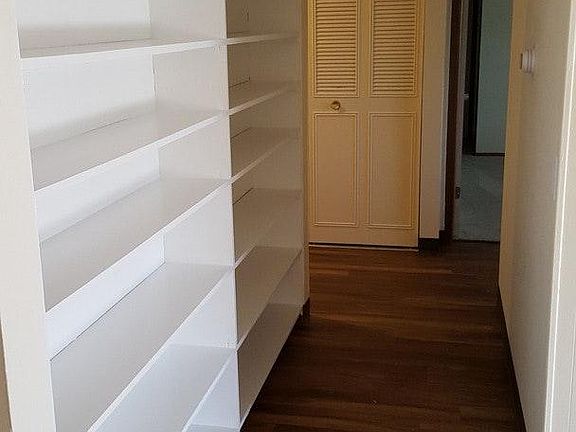 New hardwood floors with built-in shelves