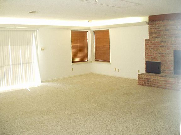 THIRD VIEW OF DEN- GOING TO THE BACK YARD DECK