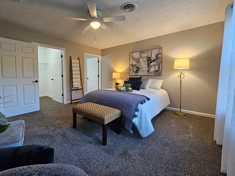 Spacious master bedroom with walk-in closet and attached full bathroom