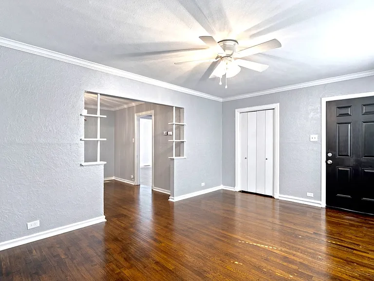 Living room, closet (#3) and front door of duplex.
