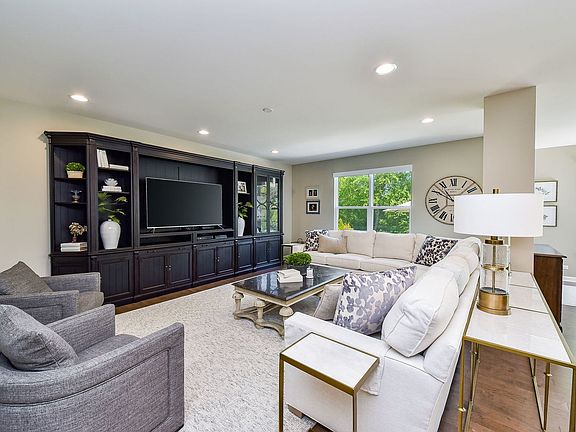 Huge great room/family room at the back of the home. The entertainment center/bookcase is newer from