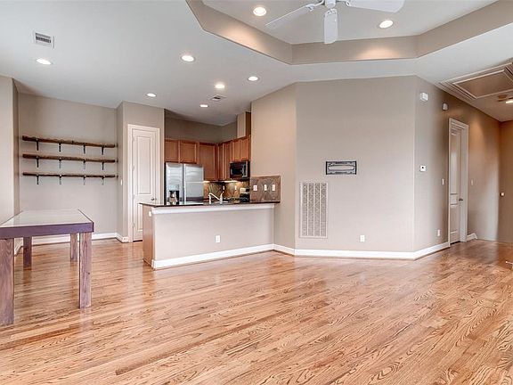 The kitchen is open to the dining and living area.
