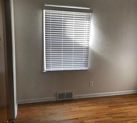 3rd bedroom with full wall sliding closet