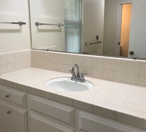 Walk through bathroom entry from hall or vanity