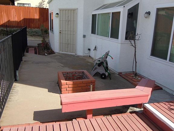 Desk, bench, and Fire pit in backyard