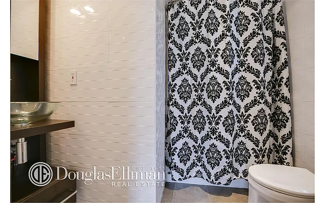 Sold by Douglas Elliman | media 12