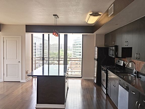 Eat-in kitchen with large breakfast bar.