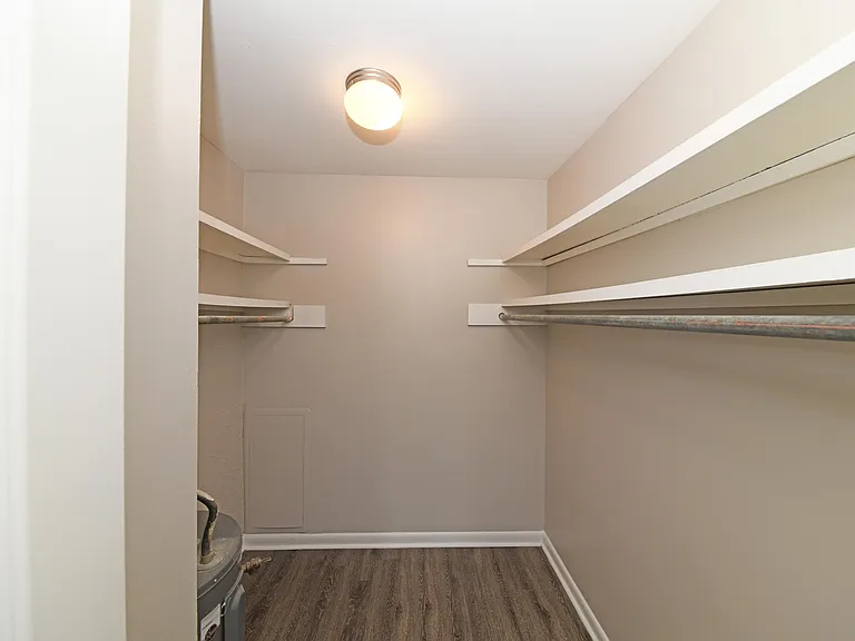 Walk-in closet with built in shelving