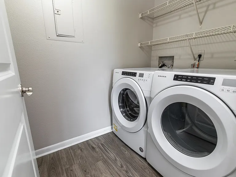 Redefine your laundry routine with chic style, as every residence boasts the convenience of full-size in-home washer and dryer units.