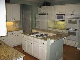 Newly updated kitchen w/ granite countertops and tiled backsplash