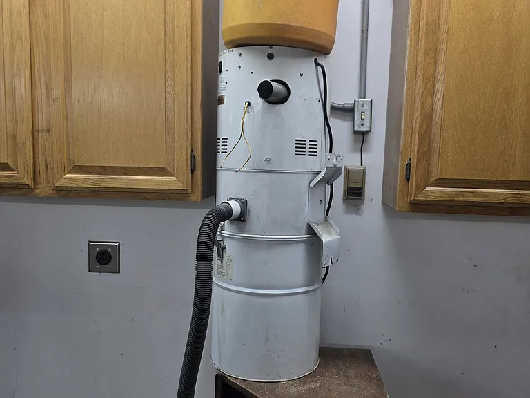 Built in vacuum cleaner and cooler