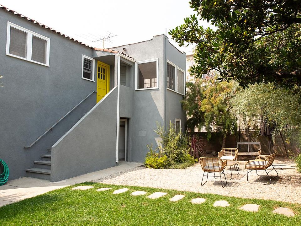 Upper unit. Mid-century duplex with private entrance and fresh exterior paint.