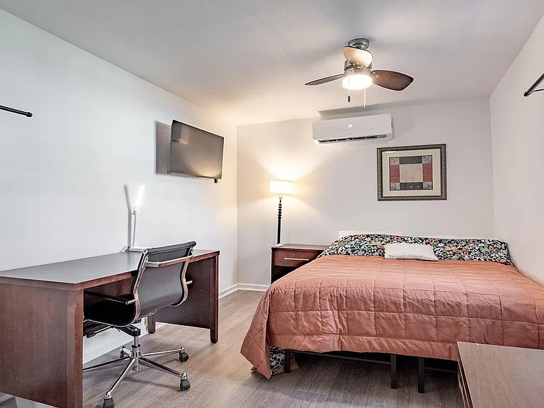 Hotel-quality queen mattress and side table