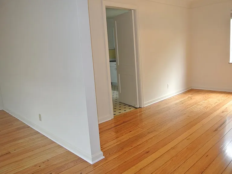 view into dining room and edge of kitchen..