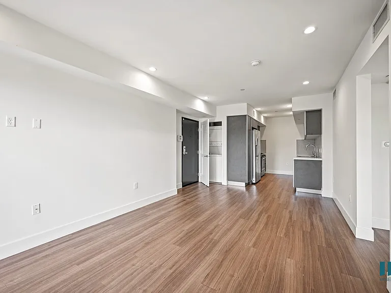 Open-Concept Kitchen, Dining, and Living Room Space