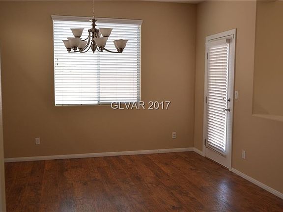 Dining Room with covered patio and back yard access.
