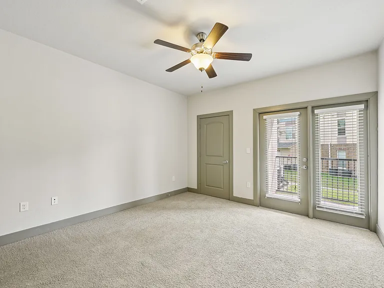 Carpeted Bedrooms keep you cozy in the winter while ceiling fans cool you in the summer.