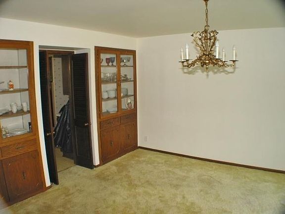 Formal dining area with built-in china cabinets