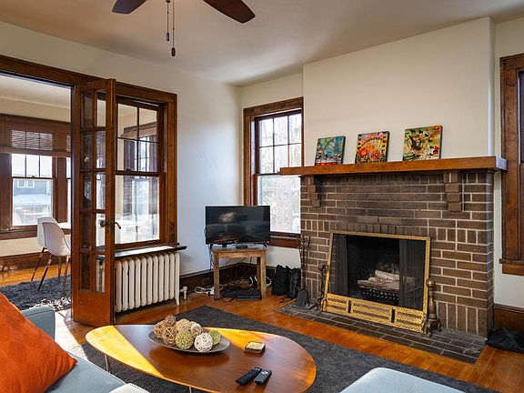 Hardwood floors and an abundance of windows throughout the unit.