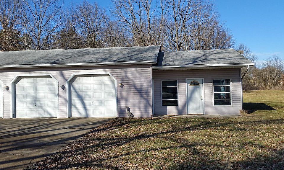 bays of garage available with attached work area