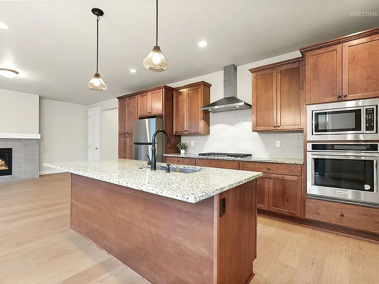 11678 NW Kearney St — Photo 8