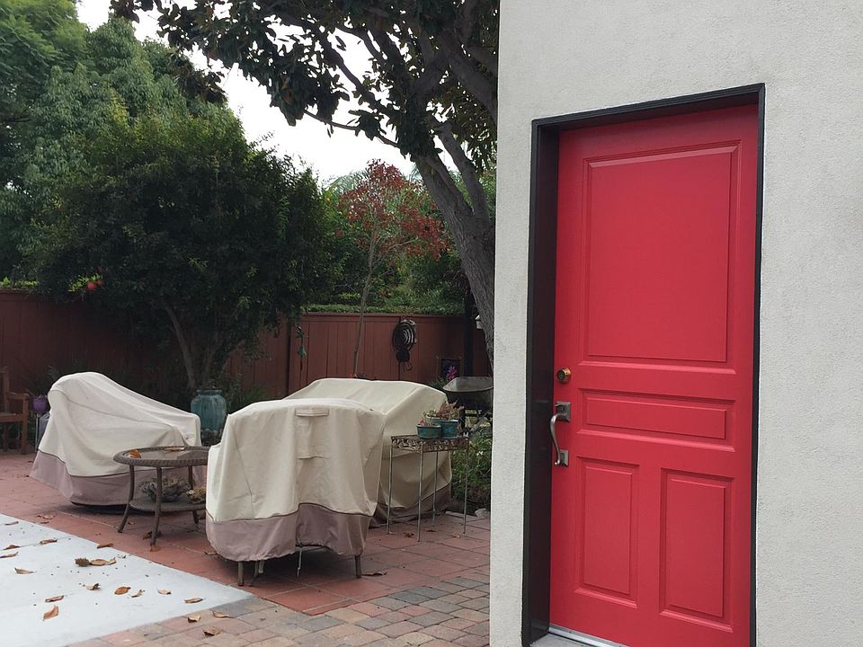 Private entrance through the red door off the driveway and great backyard.