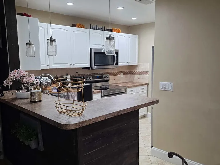 10046 Winding Lake Rd #202 — Photo 9