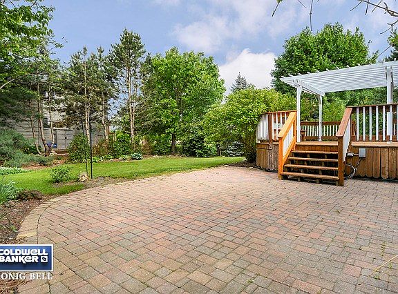 Spacious Brick Patio with Built-in Lighting.