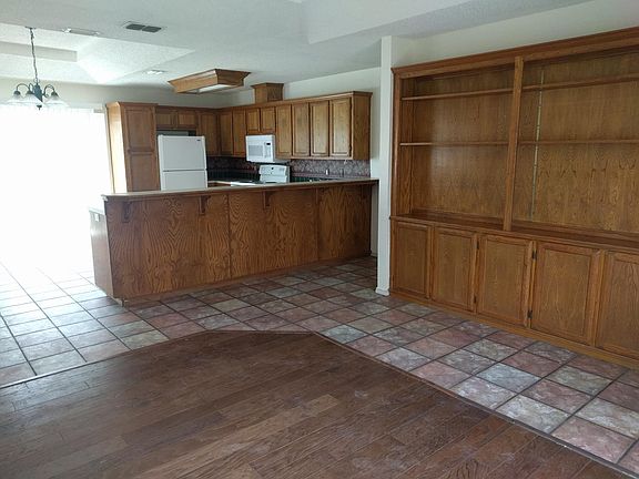 This is what you see when you walk in the front door. There is a sliding glass door out to the private patio.